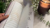 video showcasing person flipping through the journal pages